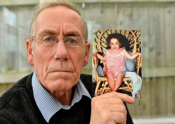 Richard Lee (68) with a photograph of his daughter Katrice aged 18months. Picture by FRANK REID