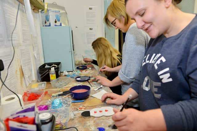 Cornerstone clients making items that will be on sale during their Christmas Fair. Picture by FRANK REID
