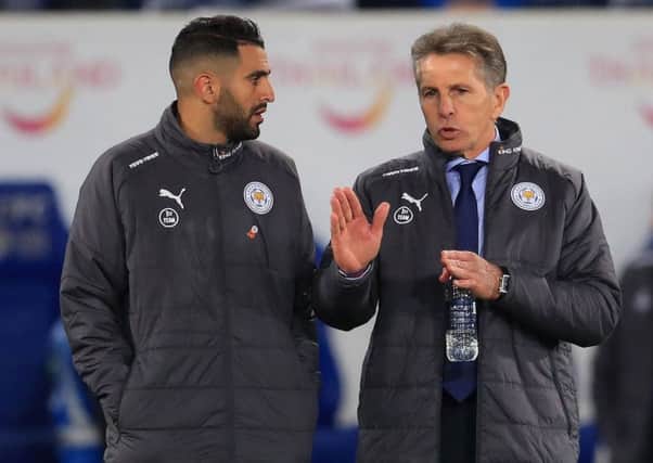Leicester boss Claude Puel speaks to on-form star Riyad Mahrez.