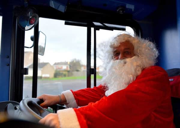 Santa bus driver Keith Willans hopes to riase as much as possible for charity.