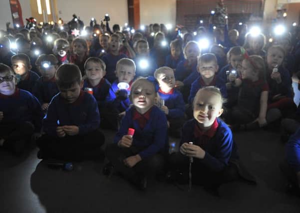 Throston Primary School pupils spending the day by torchlight, as part of an Eco day at the school.