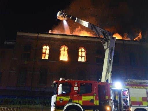 Fire crews tackle the blaze at Wesley Building.