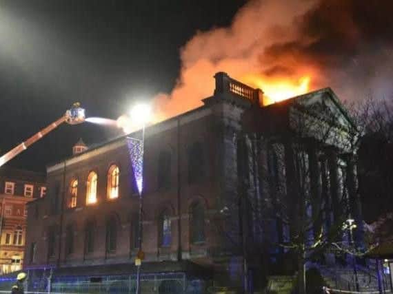 Fire crews battle the blaze on Saturday night. Picture: Tom Collins
