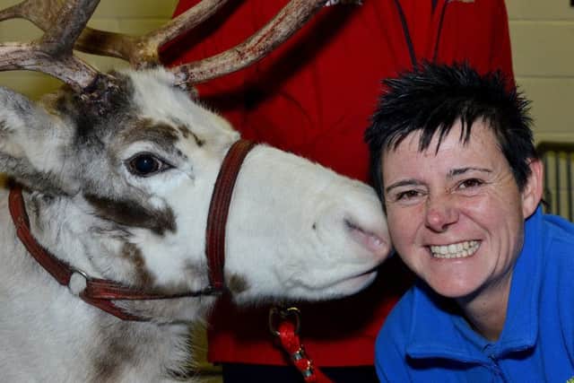 Troy the Reindeer with Eskdale Academy site supervisor Sharon Hogg. Picture by FRANK REID