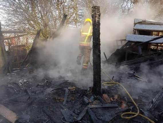 A post remains after one of the sheds was burned down. Photo by County Durham Fire and Rescue Service.