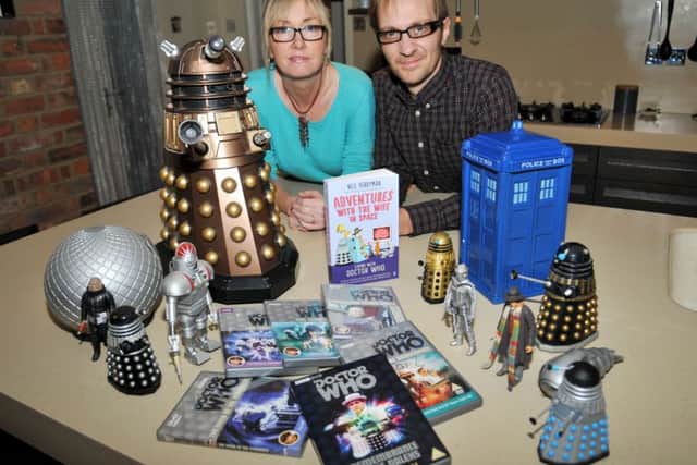 Sue and Neil Perryman at home with Doctor Who.