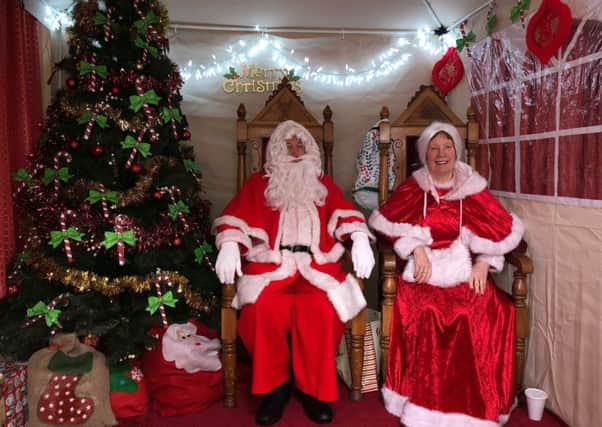 Santa and Mrs Claus are ready to welcome visitors.