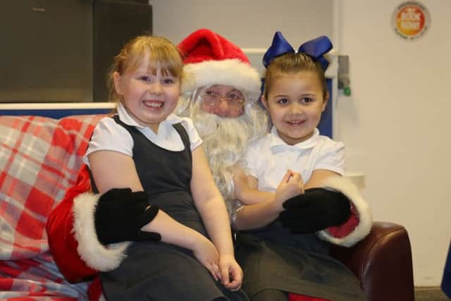 These youngsters loved meeting Santa at the party thrown by Hartlepool United boss Craig Harrison and his wife Danielle