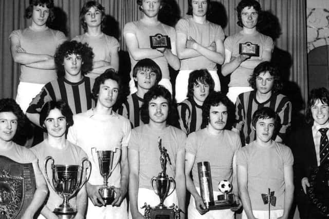 The Easington side with many of their trophies.