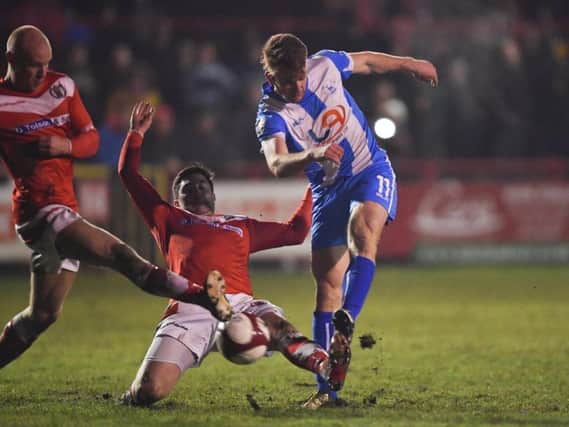 Rhys Oates has a crack at goal in Saturday's FA Trophy defeat at Workington. Picture by STEVE FLYNN/ AHPIX