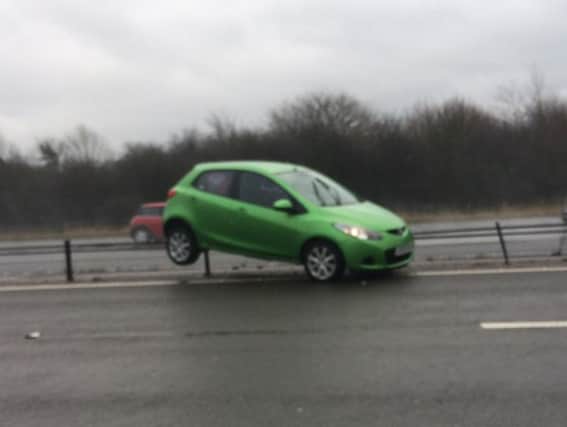 The car struck the central reservation on the A1(M). Pic: Owers Media.
