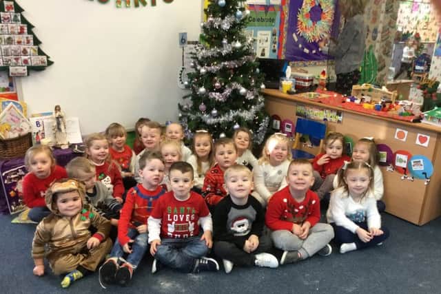 All smiles on Christmas Jumper Day at St Bega's Primary School.