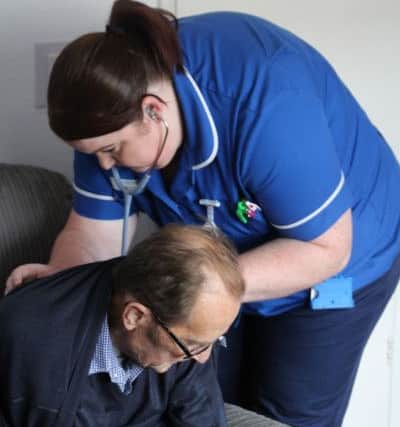 71-year-old Ken gets help from Louise after suffering from chest pains.