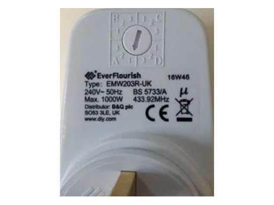 The back of a recalled plug, showing its label.