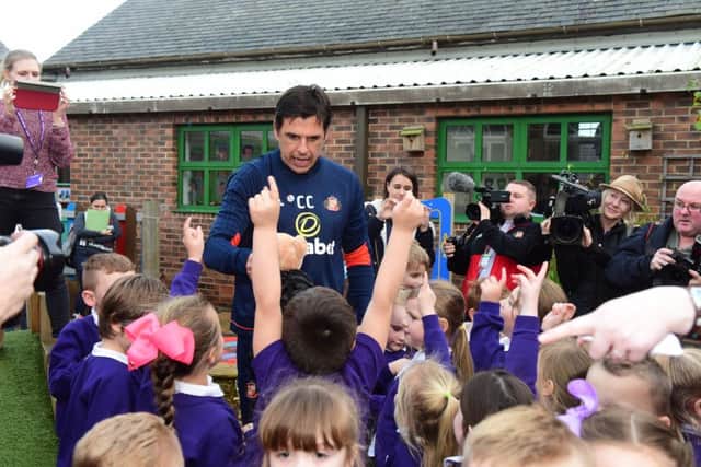 Sunderland football club manager Chris Coleman and players Bryan Ovideo and goalkeeper Mika Domingues, surprised pupils of Bradley Lowery's class at Blackhall Primary School, handing out presents and meeting the cast of the Year 5/6 Christmas play.