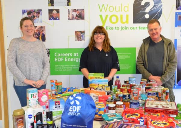 Rob Swan with Abi Knowles, left, of Hartlepool Foodbank, and Louise Corser, from Hartlepool power station.