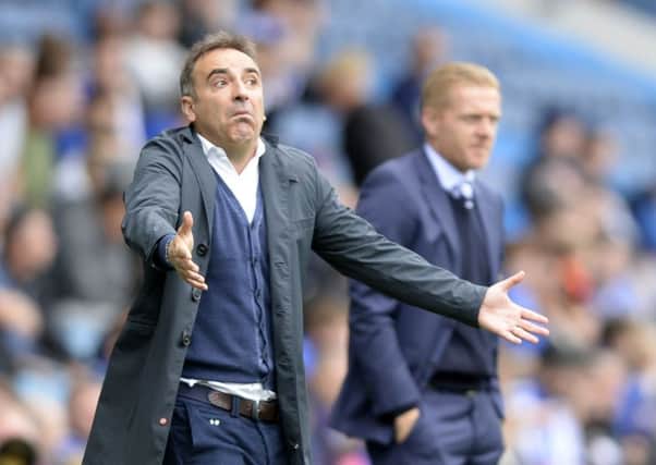 Carlos Carvalhal and Garry Monk at Hillsborough on Saturday.