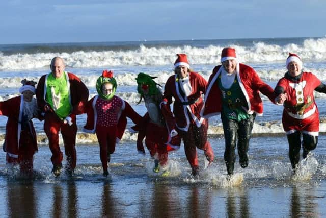 Boxing Day dippers taking part in the annual event at Seaton Carew.
