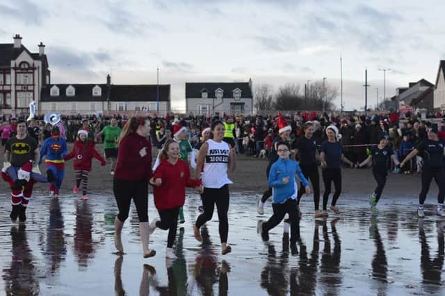 Hundreds of people took part in the annual Boxing Day Dip at Seaton Carew.