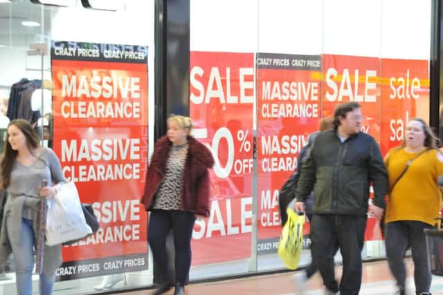 Shoppers at Middleton Grange Shopping Centre's Boxing Day sales.