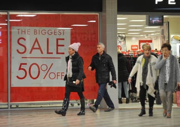Shoppers at Middleton Grange Shopping Centre's Boxing Day sales.