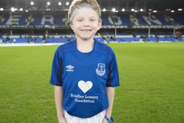 Alex pictured pitchside at Goodison Park.
