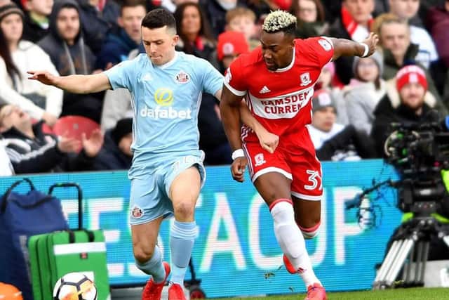 Middlesbrough ace Adama Traore battles for the ball with Sunderland midfielder George Honeyman. Pictures by Frank Reid.