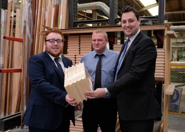 Tees Valley Mayor Ben Houchen visits apprentice James Williams (left), Dave Hennessey (centre) at Bridgeman IBC, a firm benefiting from the previous apprenticeship programme.