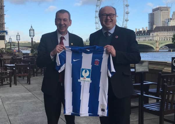Mike Hill and Graeme Morris show their support for Hartlepool United.