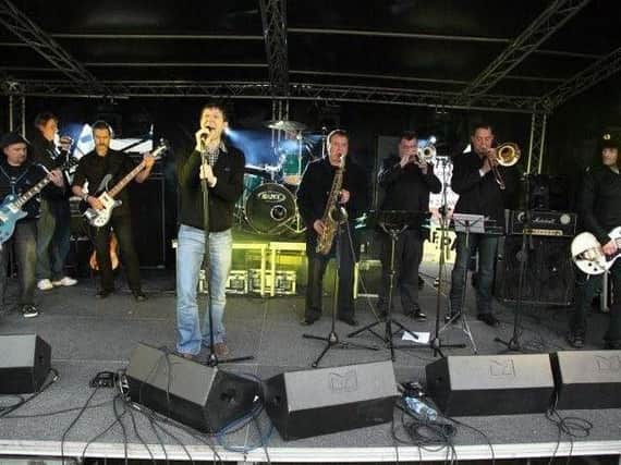 The White Negroes play at the Pitch Invasion gig in 2012.
