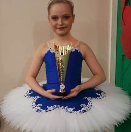 Sophie Bulmer with one of her trophies.