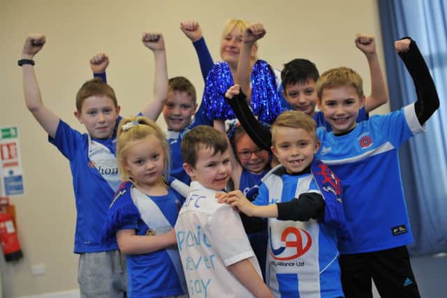 Pupils and staff at Lynnfield Primary School show their support for Hartlepool United.