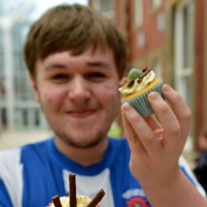 Kieran Chapman with his cakes at the Save Pools event.