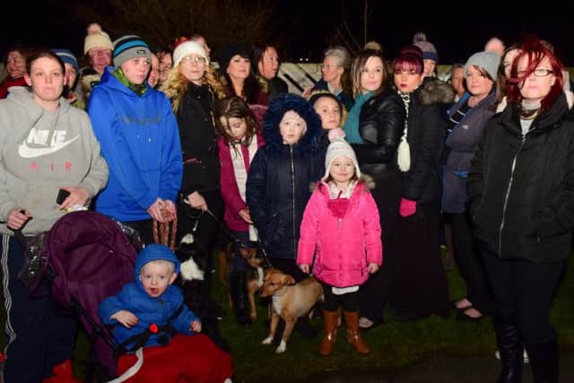 Some of those that gathered for a vigil to the dog destroyed by police off Mainsforth Terrace, Hartlepool.