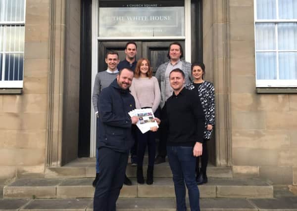 Alice House's Greg Hildreth (front right) with (from left) Blast Digital's Simon Meek, Rich Heseltine, James Renwick, Jenny Watson, Jamie Arthur and Jade Brown.