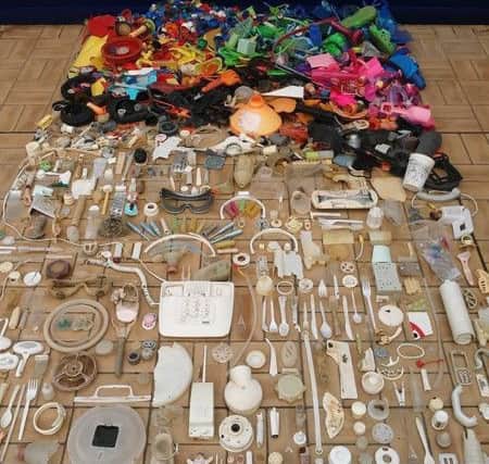 Diane's artistic work from the plastic pollution she found.