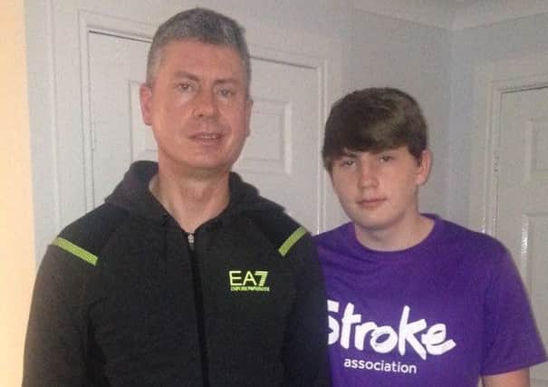 Jack Cadas with his dad Graeme who suffered a stroke