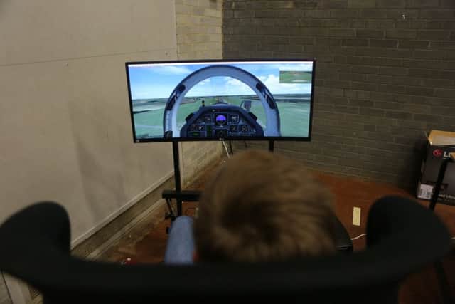 A student puts a flight simulator to the test.