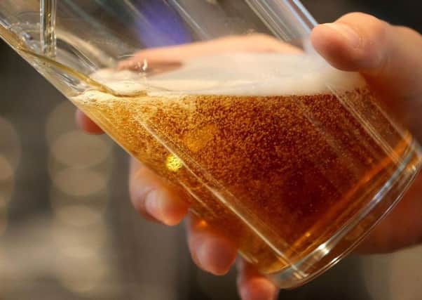 Drinkers are being urged to cut back on the booze to benefit their health.
