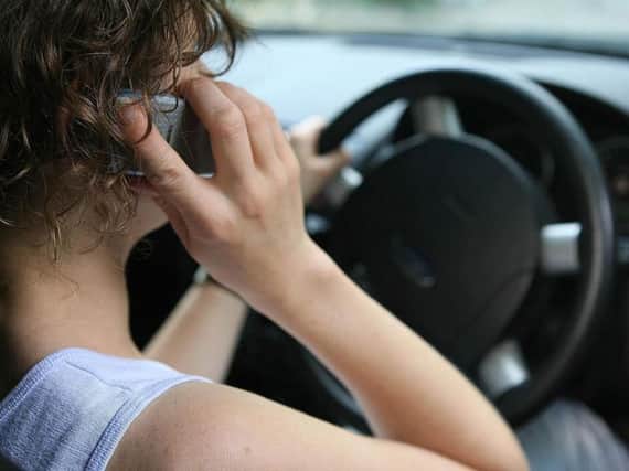 Officers caught 28 drivers using their mobile phones in a week-long clampdown.