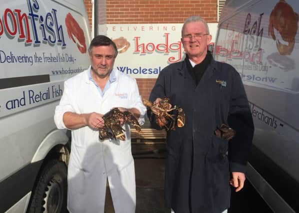 Hodgson Fish owner Alan Hodgson with with driver Colin Alsop.