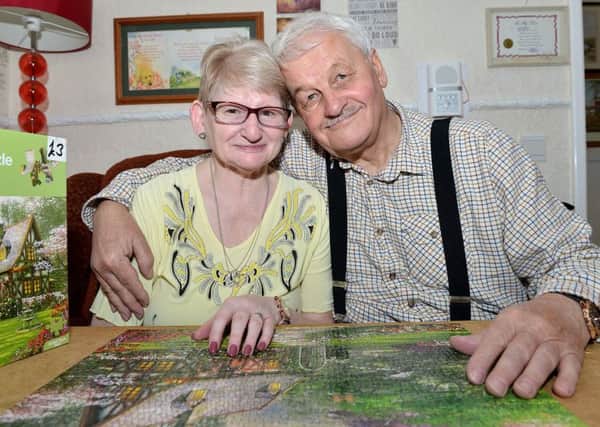 Maureen and Reg Cowling in their Central Estate home.
