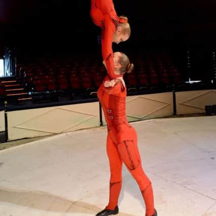Kim Dekker and Tara De Jong who are performing their acrobatic skills in the circus at Jacksons Landing. Picture by FRANK REID