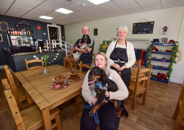 The Doggie Diner cafe in Middle Street, Blackhall are (front) Kirsty McInnes with Pippin and David with Buster and Sue Nelson.