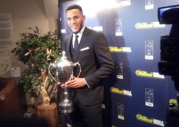 Jamaal Lascelles gets his hands on the North East Football Writers' Association's Player of the Year trophy