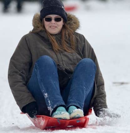 Wendy Stinchcombe sledging in Burn Valley Park. Picture by FRANK REID