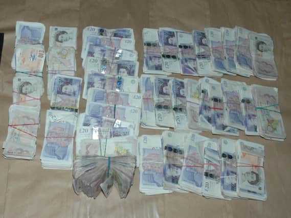 Cash seized by police from the drug groups