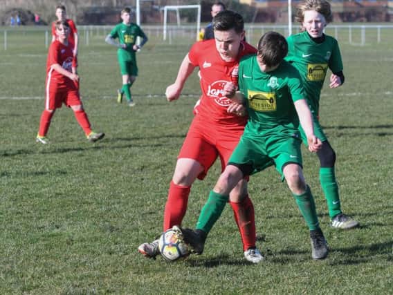 Hartlepool FC u13s, red, versus Whickham Fellside u13s, green, at Grayfields, Hartlepool.