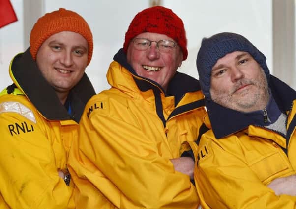 Pictured wearing some of the donated hats are Hartlepool RNLI volunteers(left to right) Liam Dunnett, Ray Walker and Andrew Booth. Picture by RNLI/Tom Collins.