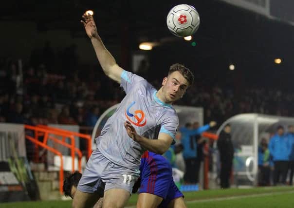 Pools' Rhys Oates forces his way past Aldershot's Lewis Kinsella on Tuesday. Picture by Gareth Williams/AHPIX.com